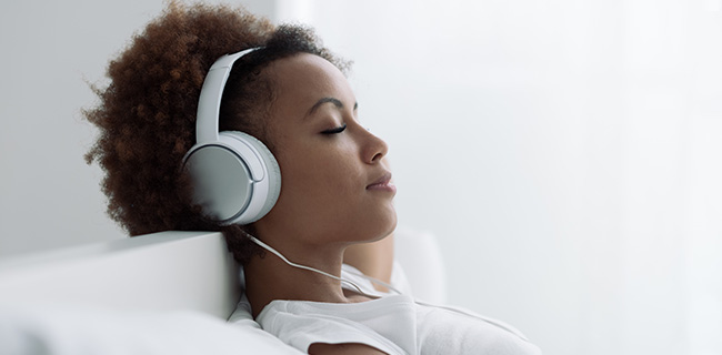 Girl listen to headphones
